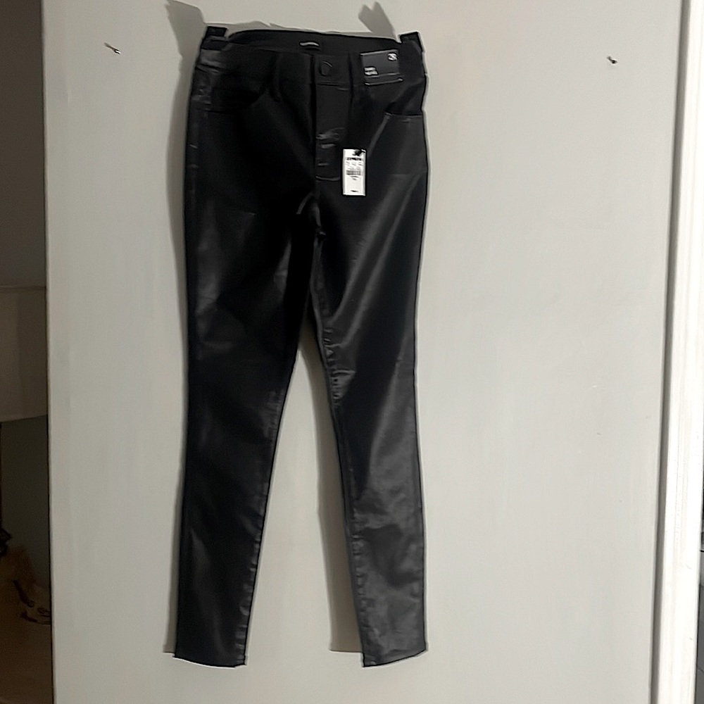 Brand new, never worn black pants.